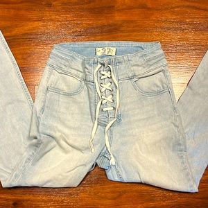 We The Free Curvy High Rise Lace Up Jeans
